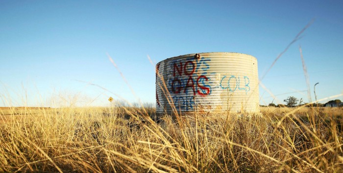 The words 'No Gas' are spray painted on the side of a tank in Narrabri, Australia. There is a renewed focus on climate change following devastating bushfires in the country