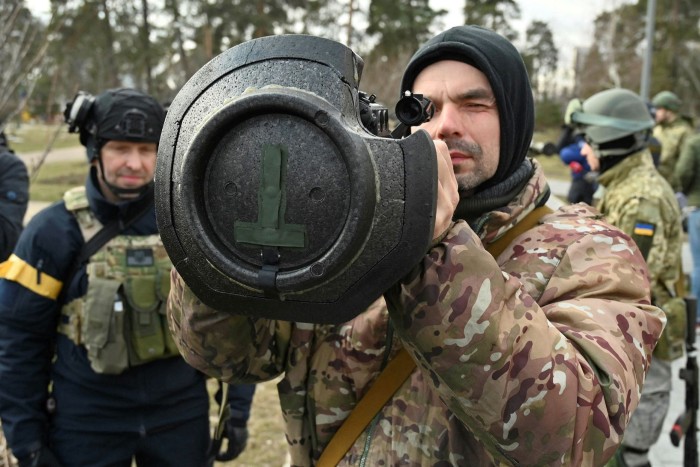 Ukrainian defence forces with NLAW anti-tank weapons in Kyiv last month