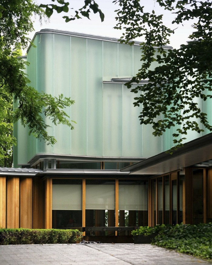 The glass-green exterior of Integral House