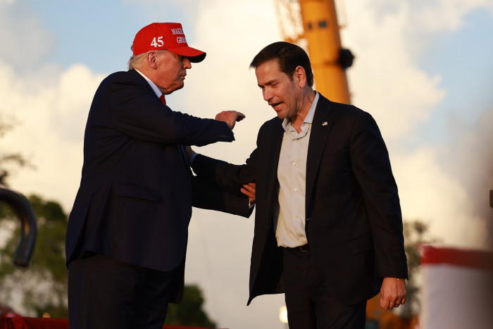 Donald Trump, left, pictured with Marco Rubio in Miami in 2022