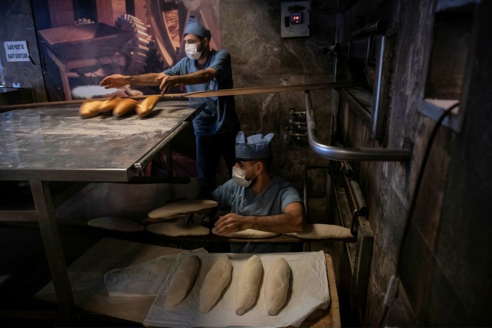 Staff bake bread at a bakery in Istanbul, Turkey