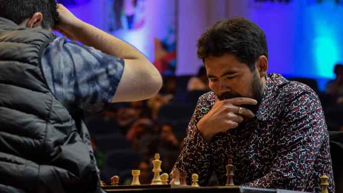 Chess grandmaster Hikaru Nakamura ponders his next move