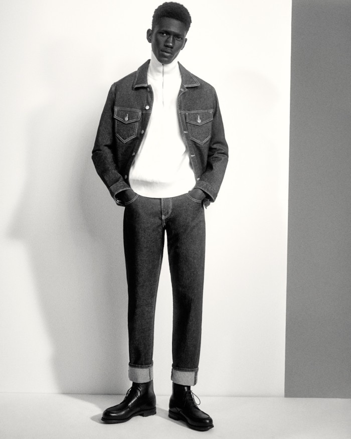 Moustapha Sy wears Guess x Friendswithyou cotton denim jacket, £115, and cotton denim trousers, £95. Louis Vuitton cashmere rollneck, £915. JM Weston leather Boxcalf Golf Montant boots, £790. Socks, model’s own