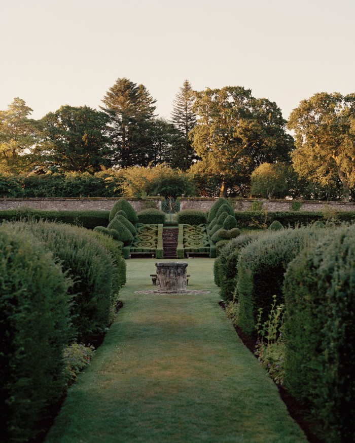 The walled garden at Airlie was built in 1790, with the yew topiary put in by the 7th Countess. A grass tennis court now sits in one square