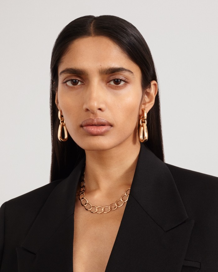 Aishwarya Gupta wears Bottega Veneta grain de poudre jacket, £1,945, Pomellato rose-gold Iconica earrings, £5,950, and Brera necklace, £7,500
