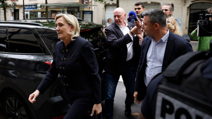 Marine Le Pen arrives at the RN headquarters