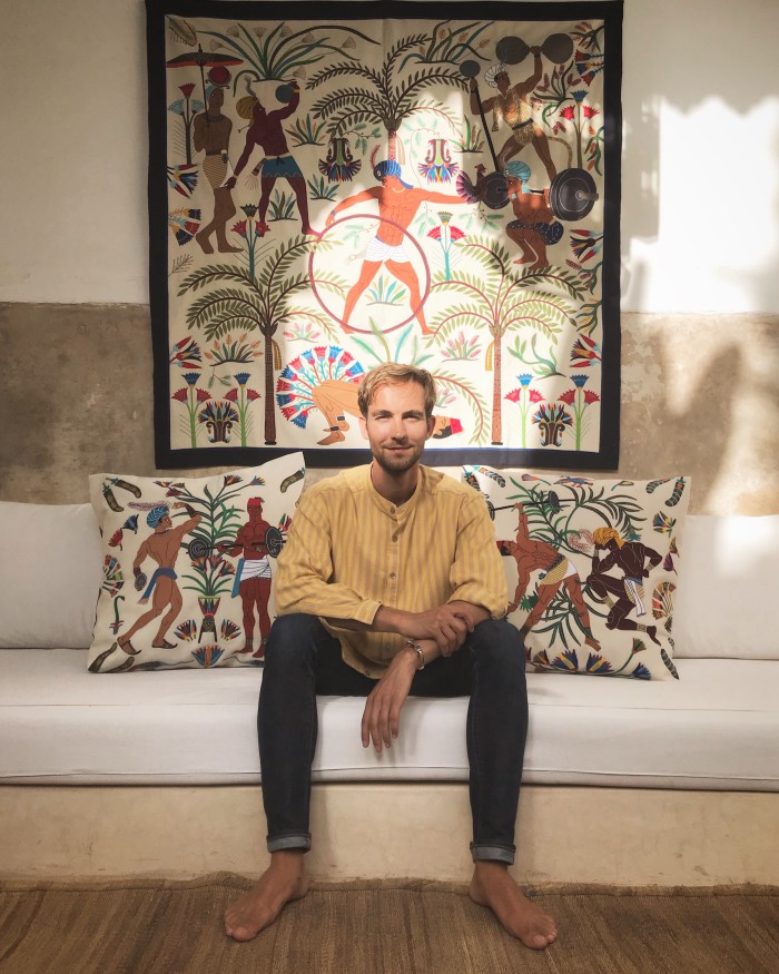 Louis Barthélemy with his ‘Nile Gym’ tapestry and embroidered cushions