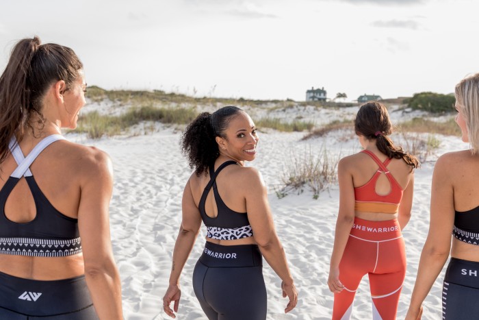 Natlyn Jones (centre) created SheWarrior in 2019 to combine style and sustainability in sportswear