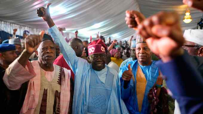 Bola Tinubu celebrates with his supporters after election officials declared him the winner of Nigeria’s presidential poll on Wednesday