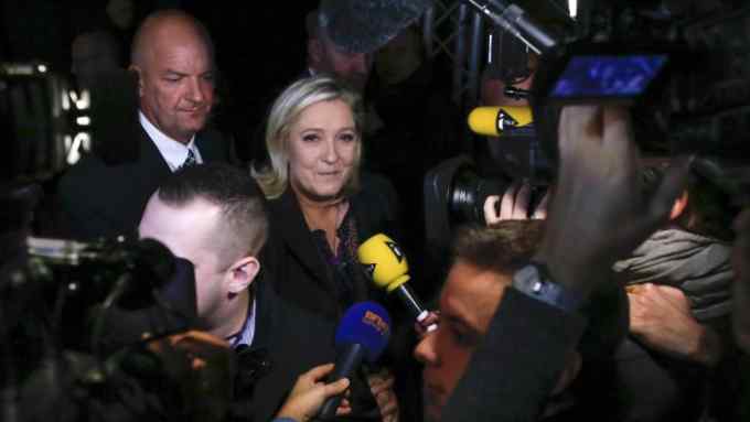 Regional elections in France...epa05068173 French far-right political party National Front (FN) Marine Le Pen (C) after the results of the second round of the regional elections in at Francois Mitterand hall in Henin-Beaumont, northern France, 13 December 2015. It is the last major election before the next presidential vote in 2017. France's anti immigration, far-right National Front will not win any region in the second round of France's regional elections, exit polls showed.  EPA/OLIVIER HOSLET