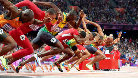 Jamaica’s Usain Bolt (third left) sets an Olympic record in the men’s 100m final in the 2012 Summer Olympics in London