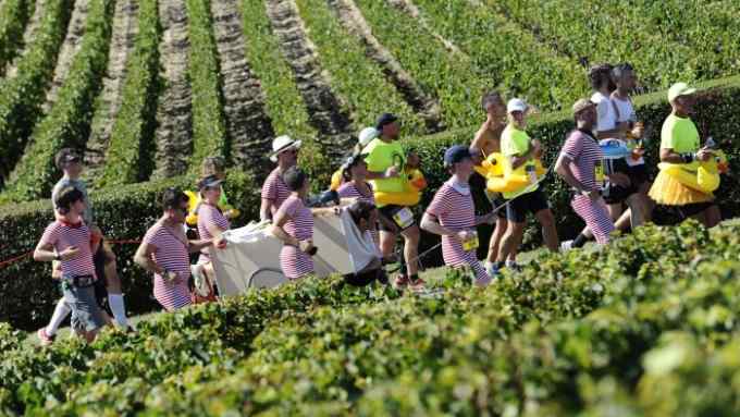 Celebrate your marathon: runners enjoy the wine-drinking Marathon du Médoc