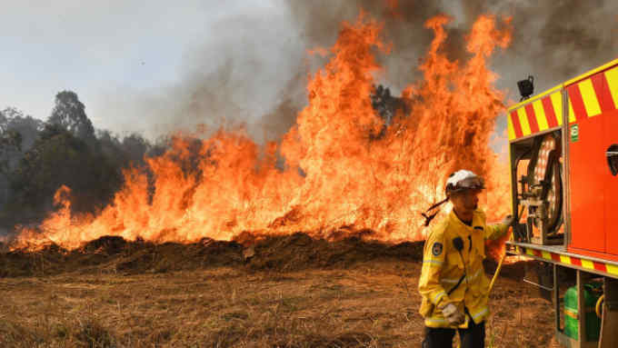 Mandatory Credit: Photo by DARREN ENGLAND/EPA-EFE/Shutterstock (10405329e) New South Wales Rural Fire Service (NSW RFS) firefighters back burning and fighting fires on Long Gully Road in the northern New South Wales town of Drake, Australia, 09 September 2019. A number of homes have been destroyed by bushfires in northern New South Wales and Queensland. Bushfires in New South Wales, Drake, Australia - 09 Sep 2019