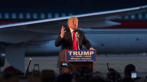 Republican presidential candidate Donald Trump addresses a rally at Millington Regional Jetport