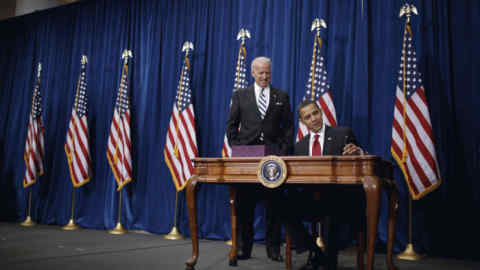 DENVER, CO - FEBRUARY 17: US Vice President Joe Biden and US President Barack Obama sign the American Recovery and Reinvestment Act at the Denver Museum of Nature and Science on February 17, 2009 in Denver, Colorado. Obama signed into law his 787-billion-dollar stimulus bill, designed to create or save 3.5 million jobs and end the worst US economic crisis since the 1930s. (Photo by Charles Ommanney/Getty Images)