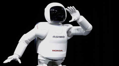 The Honda Motor Company Asimo robot during a presentation at the 2014 New York International Auto Show