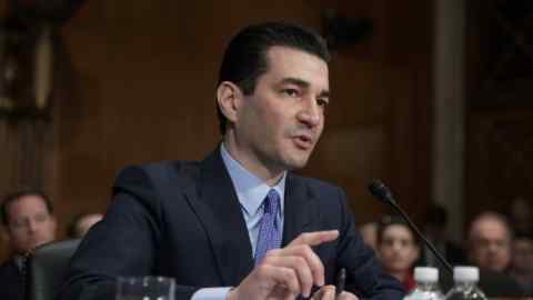 FILE - In this April 5, 2017, file photo, Dr. Scott Gottlieb speaks during his confirmation hearing before a Senate committee, in Washington, as President Donald Trump's nominee to head the Food and Drug Administration. The Food and Drug Administration Commissioner is stepping down after nearly two years leading the agency. Health and Human Services Secretary Alex Azar announced Gottlieb‚Äôs plan resignation in a statement Tuesday, March 5, 2019. (AP Photo/J. Scott Applewhite, File)