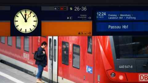 The platform clock shows five minutes prior twelve in front of a regional train of the German railway Deutsche Bahn at the central railway station in Munich, ahead of the strike of train drivers on October 15, 2014. AFP PHOTO/CHRISTOF STACHE (Photo credit should read CHRISTOF STACHE/AFP/Getty Images)
