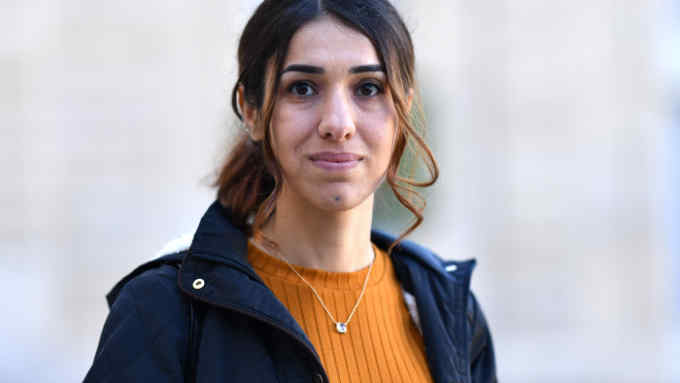 PARIS, FRANCE - OCTOBER 25: Nobel Peace Prize winner Nadia Murad poses after a meeting with French president Emmanuel Macron (not seen) at the Elysee Palace in Paris, France on October 25, 2018.  (Photo by Mustafa Yalcin/Anadolu Agency/Getty Images)