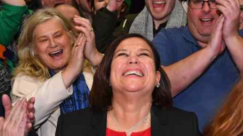 Irish republican Sinn Fein party leader Mary Lou McDonald (C) celebrates with her supporters after she takes the Dublin Central constituency on the first count in the RDS centre in Dublin, Ireland on February 9, 2020, the day after the vote took place in the Irish General Election. - Irish officials started tallying votes on Sunday in a general election forecast to put prime minister Leo Varadkar's party in a historic three-way tie, after a surge from republican party Sinn Fein. Counting began at 0900 GMT after an exit poll predicted Varadkar's Fine Gael party, the Fianna Fail party and Sinn Fein all received 22 per cent of first preference votes in Saturday's election. (Photo by Ben STANSALL / AFP) (Photo by BEN STANSALL/AFP via Getty Images)