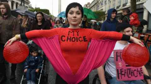 Demonstrators take part in a protest to urge the Irish Government to repeal the 8th amendment to the constitution, which enforces strict limitations to a woman's right to an abortion, in Dublin, Ireland September 24, 2016. REUTERS/Clodagh Kilcoyne - LR1EC9O17HSCC