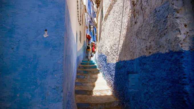 Mystery tour: tourists walking in the medina of the north-western city of Chefchaouen