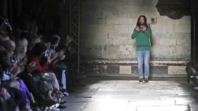 LONDON, ENGLAND - JUNE 02: Alessandro Michele, Gucci Creative Director, bows on the runway during the Gucci Cruise 2017 fashion show at the Cloisters of Westminster Abbey on June 2, 2016 in London, England. (Photo by John Phillips/Getty Images for GUCCI)