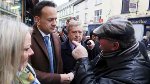 Taoiseach Leo Varadkar is confronted during the last day of general election campaigning in Ennis, Co Clare. PA Photo. Picture date: Friday February 7, 2020. See PA story IRISH Election. Photo credit should read: Brian Lawless/PA Wire