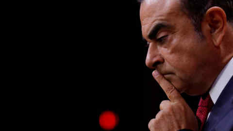 FILE PHOTO - Carlos Ghosn, Chairman and CEO of the Renault-Nissan Alliance, reacts during a news conference in Paris, France, September 15, 2017. REUTERS/Philippe Wojazer/File Photo
