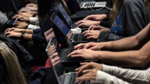 Students of the Catholic University of Lyon use laptops to take notes in a classroom, on September 18, 2015 in Lyon, eastern France