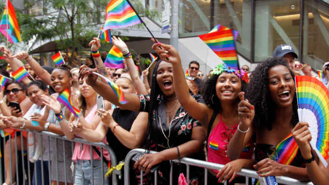 P57CFA New York, USA. 24th June, 2018. Spectators along the route of the 49th annual Pride parade in New York City, on June 24th, 2018. Credit: Adam Stoltman/Alamy Live News