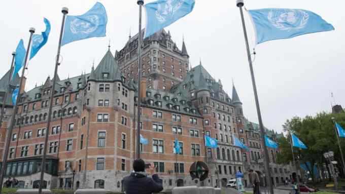 UN flags fly in front of the Fairmont Le Chateau Frontenac in Quebec City on June 5, 2018. Attention this week turns to the Group of Seven summit that begins Friday in Quebec, where Donald Trump is expected to face criticism over his decision to lump tariffs on Canadian, Mexican and European steel and aluminium. / AFP PHOTO / Alice ChicheALICE CHICHE/AFP/Getty Images