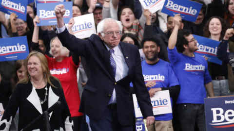 Democratic presidential candidate Sen. Bernie Sanders, I-Vt., with his wife Jane O'Meara Sanders, arrives to speak to supporters at a primary night election rally in Manchester, N.H., Tuesday, Feb. 11, 2020. (AP Photo/Pablo Martinez Monsivais)