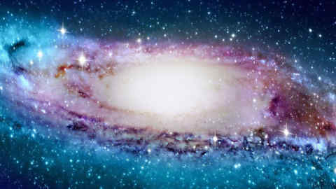 EMBARGOED TO 1600 MONDAY FEBRUARY 4 Undated artist impression of the Milky Way as the spinning spiral galaxy that is the sun's home is bent towards its edges, astronomers have discovered. PRESS ASSOCIATION Photo. Issue date: Monday February 4, 2019. Until now the galaxy was generally thought to be a flat spiral consisting of an estimated 250 billion stars. The sun and its planets, including the Earth, occupy an insignificant spot in one of the minor spiral arms. But a new study has shown that in reality the Milky Way is warped. It becomes increasingly twisted the further away stars are from the galactic centre. See PA story SCIENCE Galaxy. Photo credit should read: CHEN Xiaodian/PA Wire NOTE TO EDITORS: This handout photo may only be used in for editorial reporting purposes for the contemporaneous illustration of events, things or the people in the image or facts mentioned in the caption. Reuse of the picture may require further permission from the copyright holder.