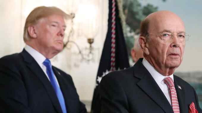 WASHINGTON, DC - MARCH 22: Commerce Secretary Wilbur Ross (R) speaks before U.S. President Donald Trump signed a presidential memorandum aimed at what he calls Chinese economic aggression in the Roosevelt Room at the White House on March 22, 2018 in Washington, DC. (Photo by Mark Wilson/Getty Images)
