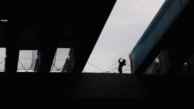 An Indonesian laborer works at a construction site in Jakarta, Indonesia, 25 July 2016