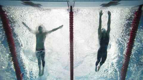 Swimming: 2008 Summer Olympics: Underwater view of USA Michael Phelps (L) and Serbia Milorad Cavic (R) in action, touching wall to finish Men's 100M Butterfly Final at National Aquatics Center ( Water Cube ). Phelps won gold medal by .01 and set Olympic record with time of 50.58. Beijing, China 8/16/2008 CREDIT: Heinz Kluetmeier (Photo by Heinz Kluetmeier /Sports Illustrated/Getty Images) (Set Number: X80790 TK2 R1 F16 )
