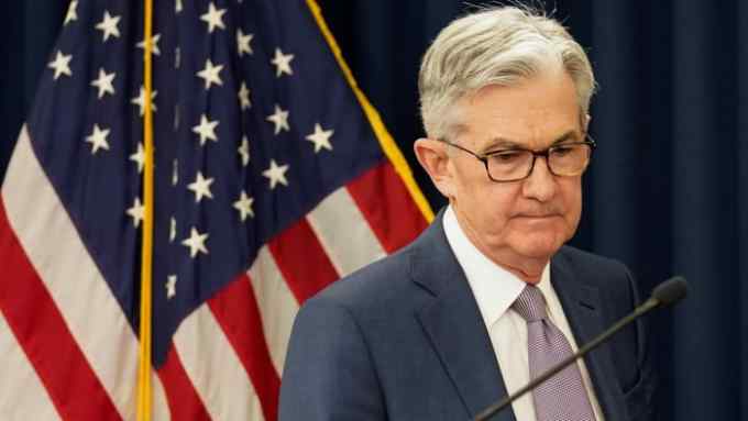 FILE PHOTO: U.S. Federal Reserve Chairman Jerome Powell arrives to speak to reporters after the Federal Reserve cut interest rates in an emergency move designed to shield the world's largest economy from the impact of the coronavirus, in Washington, U.S., March 3, 2020. REUTERS/Kevin Lamarque/File Photo