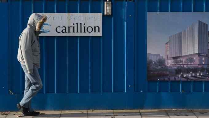 LIVERPOOL, ENGLAND - JANUARY 19:  Defaced branding is seen outside Carillion's Royal Liverpool Hospital site which is being built by the construction company on January 19, 2018 in Liverpool, England. The company has announced it is to go into liquidation putting thousands of jobs at risk after talks between the company, its lenders and the government failed to reach a deal.  (Photo by Christopher Furlong/Getty Images)