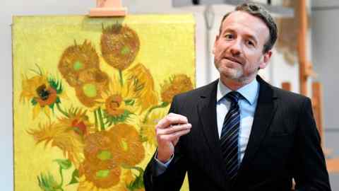 Van Gogh Museum's Director Axel Ruger presents the research results and condition of the restoration of Van Gogh's painting &quot;Sunflowers&quot; in Amsterdam, Netherlands January 24, 2019. REUTERS/Piroschka van de Wouw - RC1BD4715310