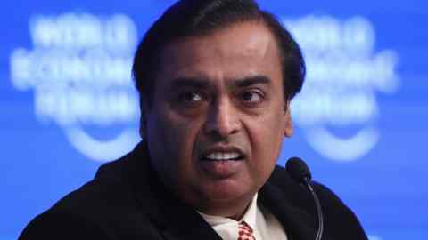 Mukesh Ambani, billionaire, chairman and managing director of Reliance Industries Ltd., pauses during a panel session at the World Economic Forum (WEF) in Davos, Switzerland, on Tuesday, Jan. 17, 2017. World leaders, influential executives, bankers and policy makers attend the 47th annual meeting of the World Economic Forum in Davos from Jan. 17 - 20. Photographer: Simon Dawson/Bloomberg