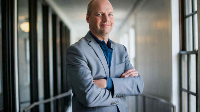 Sebastian Thrun, co-founder and chief executive officer of Udacity Inc., stands for a photograph after a Bloomberg West Television interview in San Francisco, California, U.S., on Friday, March 14, 2014