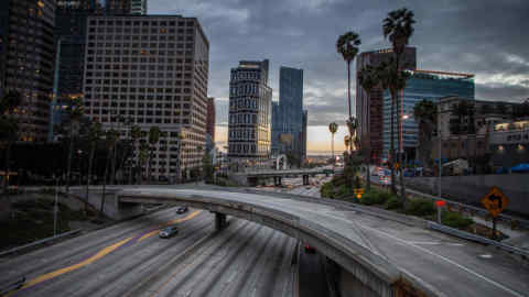 The 110 Freeeway is seen in downtown Los Angeles, California on March 15, 2020. - Bars, restaurants and nightclubs in Los Angeles were ordered to close from midnight on Sunday until March 31 as US cities take drastic action to halt the spread of the deadly coronavirus. (Photo by Apu GOMES / AFP) (Photo by APU GOMES/AFP via Getty Images)