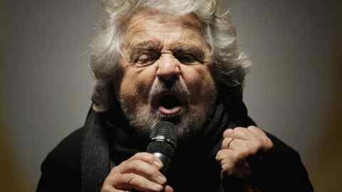 The leader of the Five Star Movement, Beppe Grillo, delivers a speech during a campaign meeting upon a referendum on constitutional reforms, on December 2, 2016 in Piazza San Carlo in Turin. Beppe Grillo, leader of the populist Five Star Movement calls his supporters to vote NO at the referendum on constitution which be held on December 4, 2016. / AFP / MARCO BERTORELLO (Photo credit should read MARCO BERTORELLO/AFP/Getty Images)