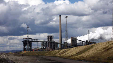 The steel works operated by Tata Steel Ltd. stand in Port Talbot, U.K. on Thursday, March 31, 2016. Tata Steel, part of India's biggest conglomerate, said a slump in global prices has forced it to consider selling its U.K. business after concluding that a restructuring of its strip-products unit, centered on Port Talbot, is unaffordable. Photographer: Chris Ratcliffe/Bloomberg