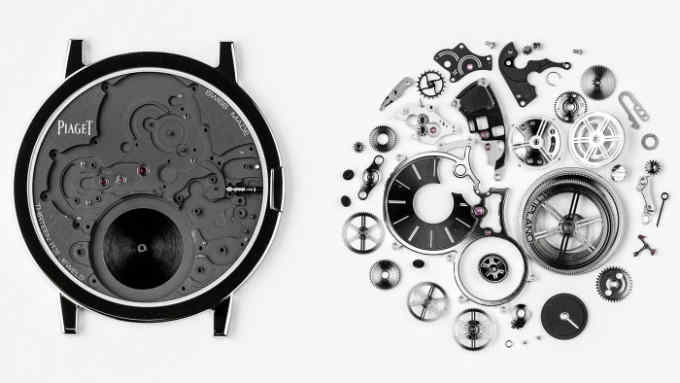 A prototype wristwatch limited to three pieces is photographed alongside its constituting components at the Piaget headquarters in Geneva, Switzerland, Wednesday, December 13, 2017. (KEYSTONE/Valentin Flauraud)