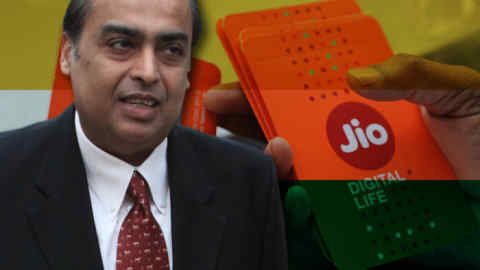 Mukesh Ambani / A customer selects his number of Reliance Jio Infocomm 4G mobile services in Mumbai on September 6, 2016