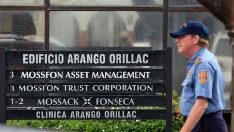 epa05256208 A private security guard outside the headquarters of Mossack Fonseca firm, in Panama City, Panama, 12 April 2016. Panama's Prosecutor office raided the headquarters of Mossack Fonseca as part of a regular investigation opened after the Panama Papers leak. EPA/Alejandro Bolivar