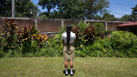 Safe space: Cecilia, 17, in the garden of a centre for youth education in Valle de San Andres, El Salvador