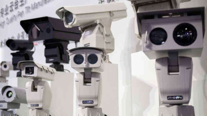 AI (artificial intelligence) security cameras using facial recognition technology are displayed at the 14th China International Exhibition on Public Safety and Security at the China International Exhibition Center in Beijing on October 24, 2018. (Photo by NICOLAS ASFOURI / AFP) (Photo by NICOLAS ASFOURI/AFP via Getty Images)